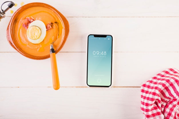 Traditional Spanish Food Mockup With Smartphone Psd