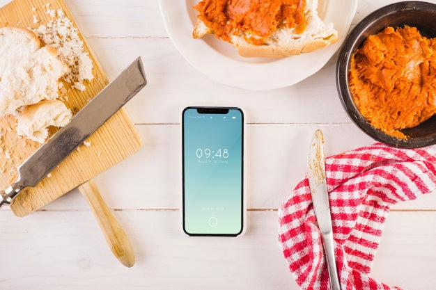 Traditional Spanish Food Mockup With Smartphone Psd