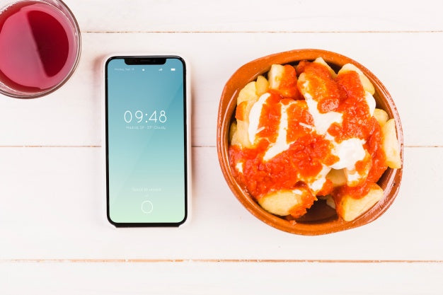 Traditional Spanish Food Mockup With Smartphone Psd