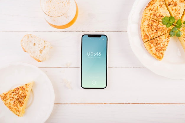 Traditional Spanish Food Mockup With Smartphone Psd