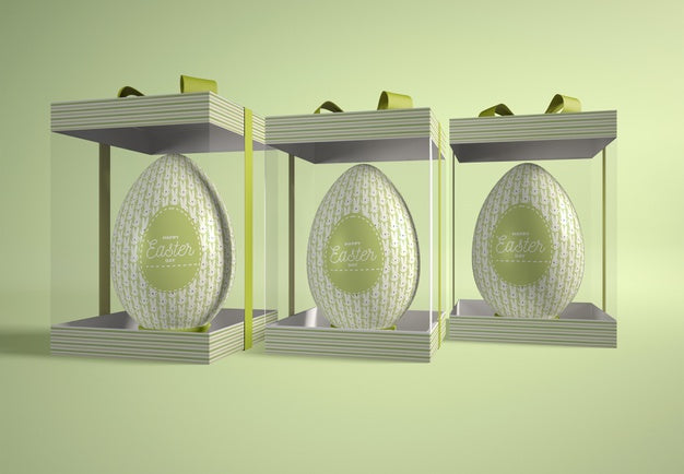 Transparent Boxes With Easter Eggs On Table Psd