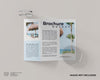 Trifold Brochure With Two Cylinder Glass Looks Top View Psd