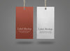 Two Paper Labels On Grey Surface Mockup Psd