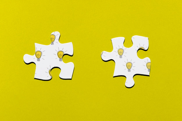 Two Puzzle Pieces On Yellow Background Psd