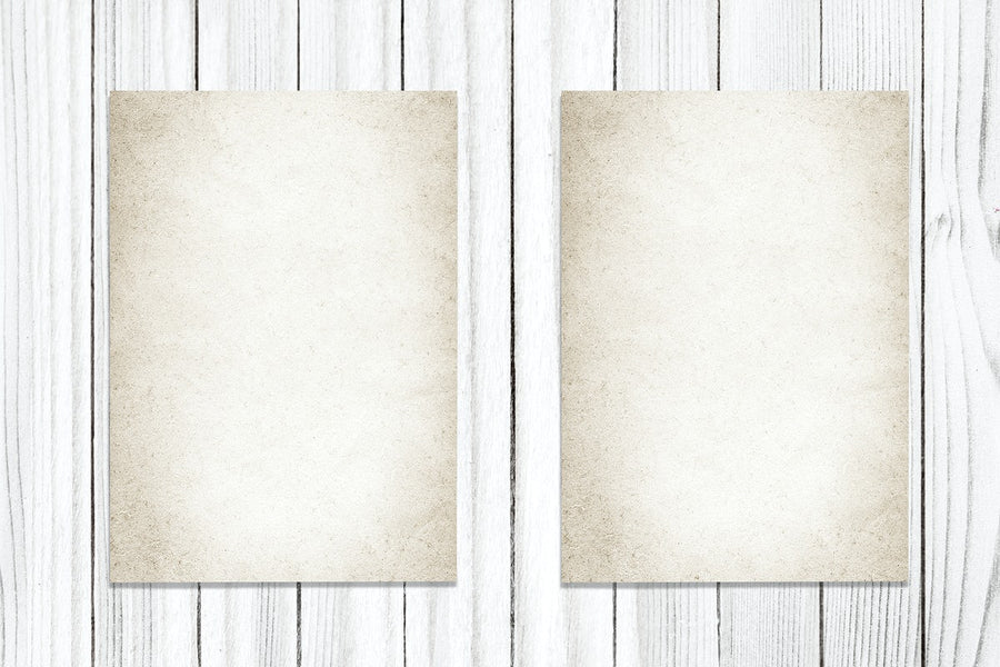 Two Vintage Papers On A Wooden Background