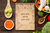 Vegetables On Table Beside Notebook Psd