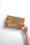 Vertical Mockup Woman Hand Opening Postal Box With Ribbons Psd