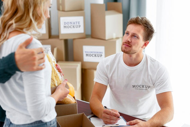 Volunteers Preparing Food Boxes For Donation Psd