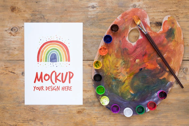 Watercolors And Brush On Desk Psd