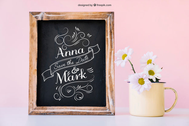 Wedding Decoration With Slate Next To Mug Psd
