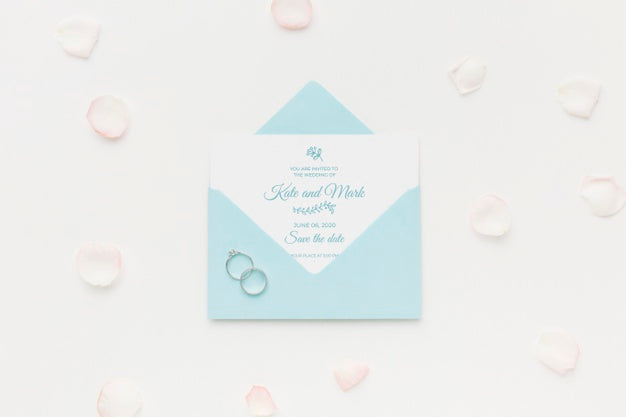 Wedding Rings And Invitation Mock-Up With Petals Psd