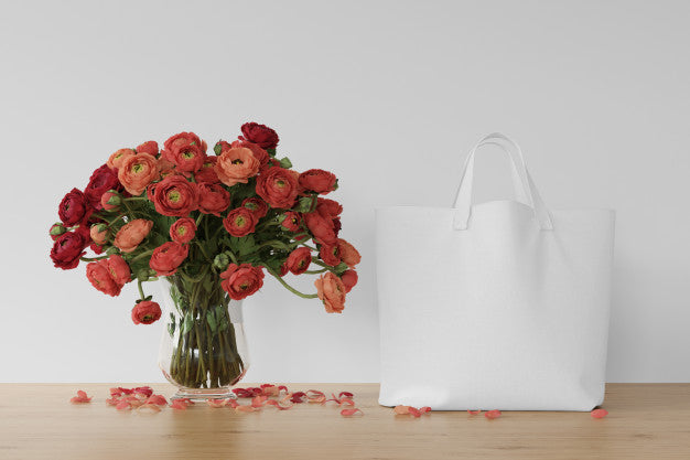 White Bag And Flowers In A Vase Psd