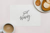 White Card Mockup On A Pastel Pink Table Psd