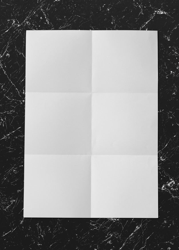 White Folded Paper On Marble Mockup Psd