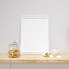 White Frame Mockup On A Kitchen Counter With Delicious Cookies Psd