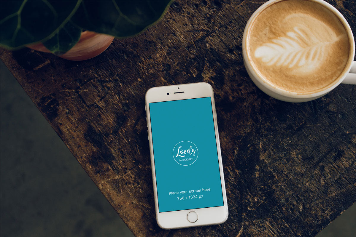 White iPhone 8 Mockup with Coffee Mug on Vintage Wooden Table