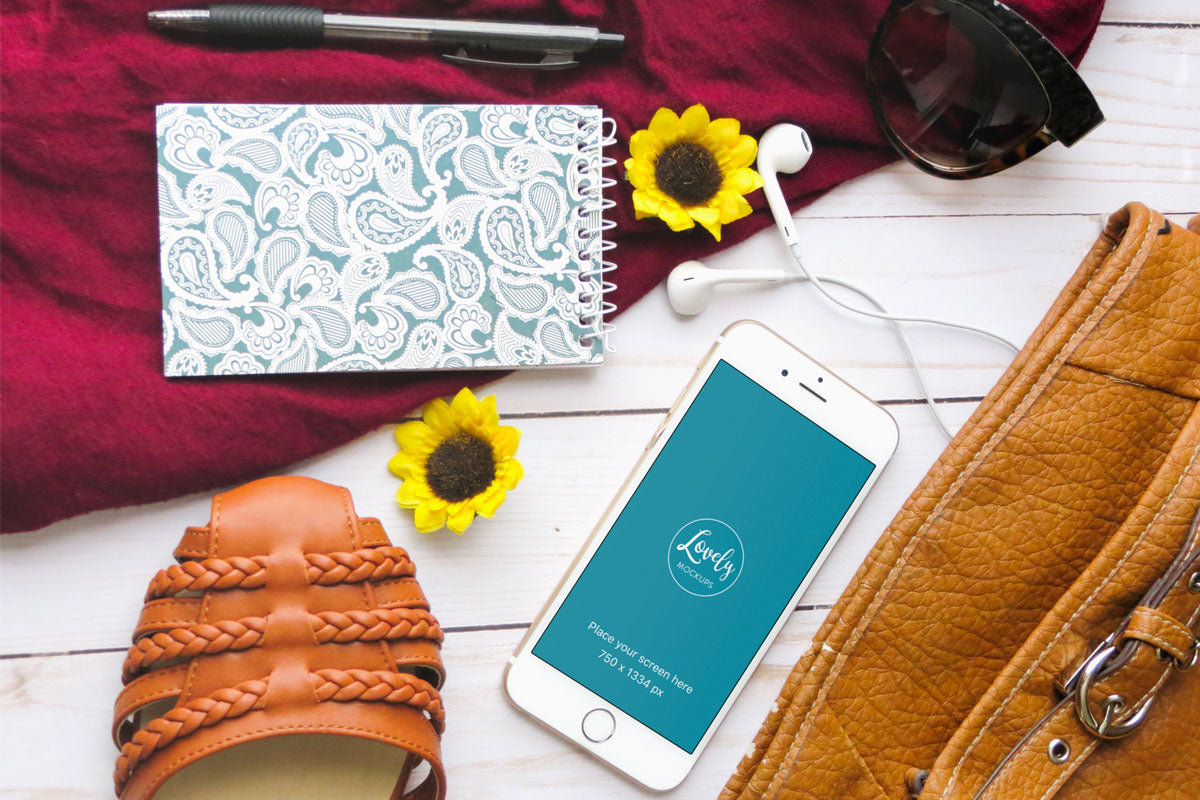 White iPhone 8 Mockup On A Creative Desk