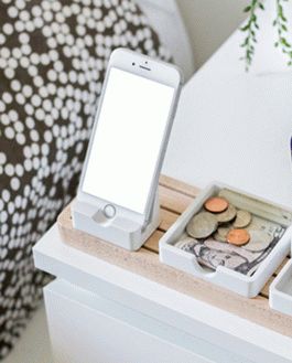 White Iphone On A Nightstand
