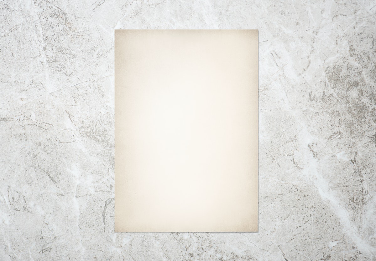 White Paper On A Gray Marble Background