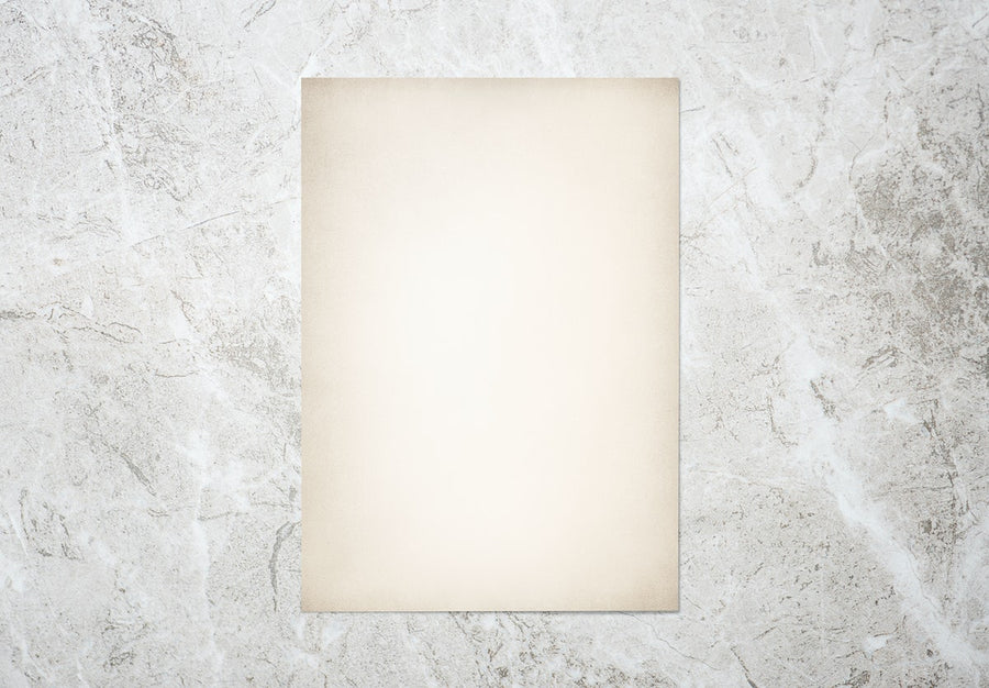 White Paper On A Gray Marble Background