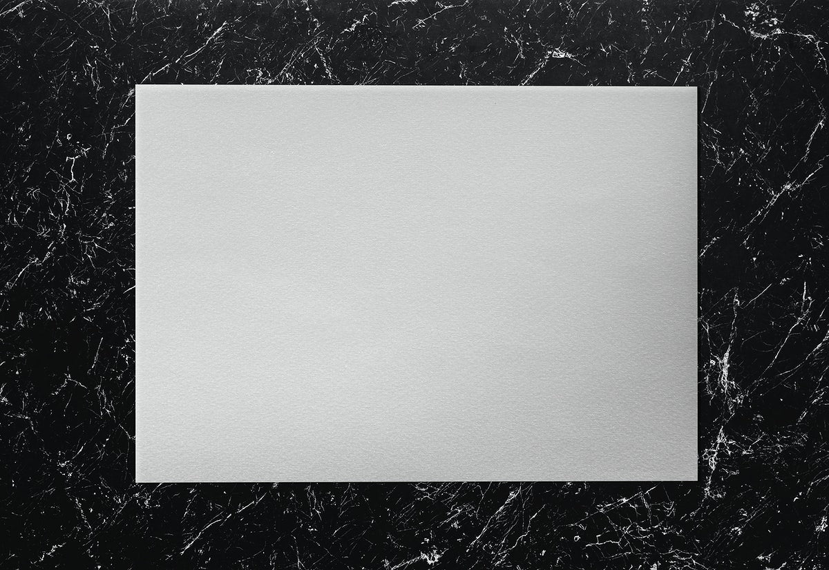 White Paper On A Marble Background