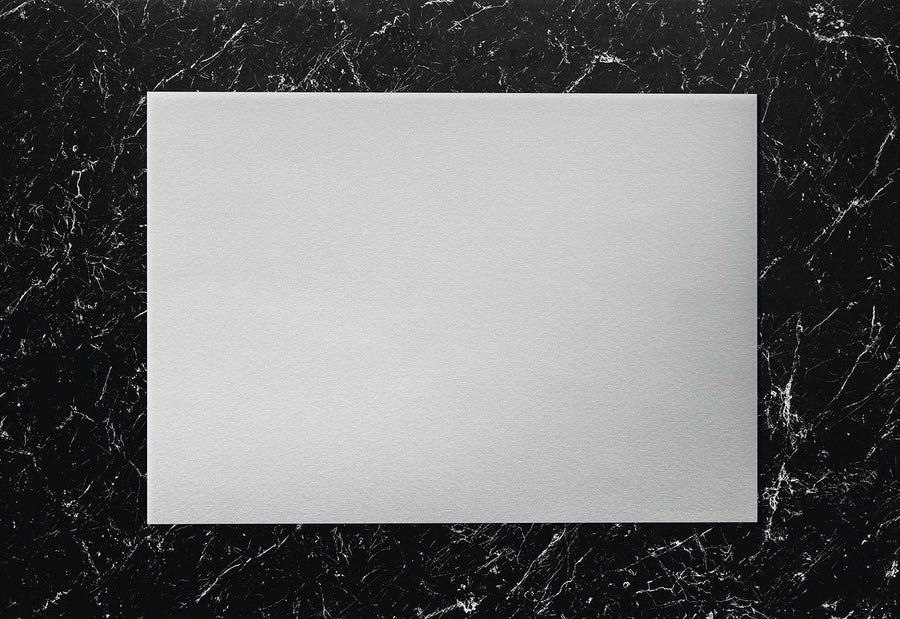 White Paper On A Marble Background