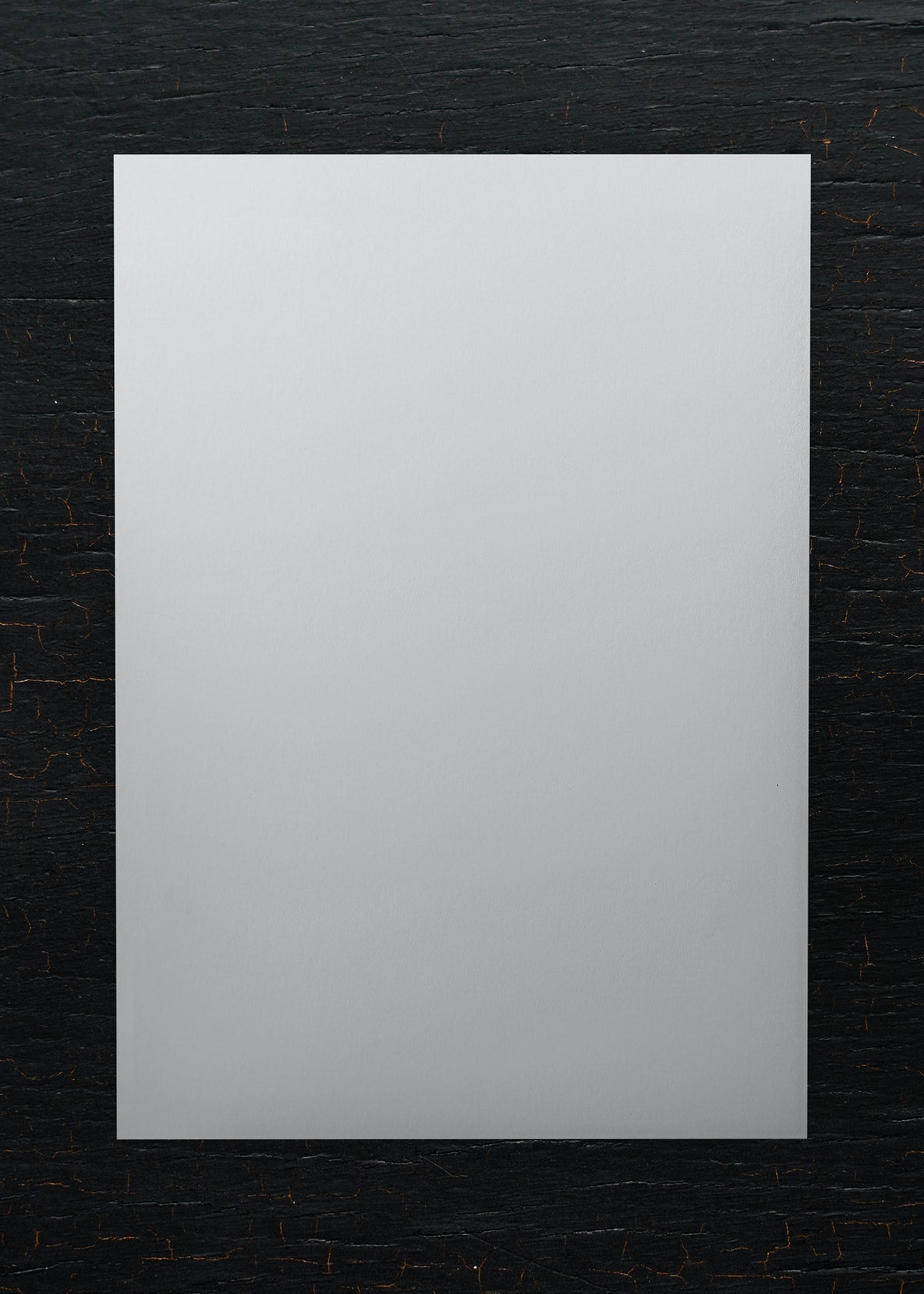 White Paper On A Wooden Background