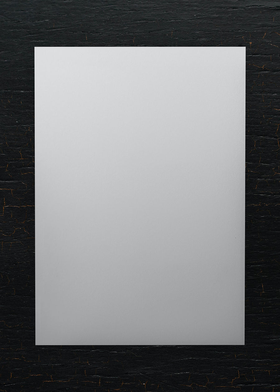 White Paper On A Wooden Background