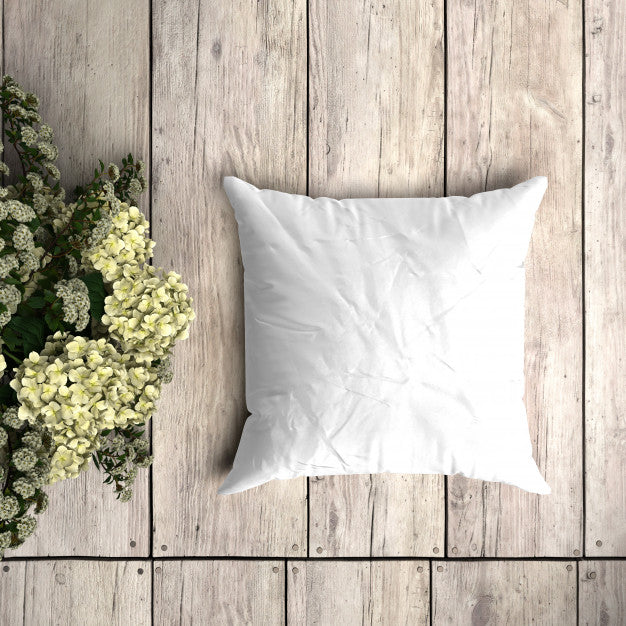White Pillowcase Mockup On A Wooden Plank With Floral Decoration Psd