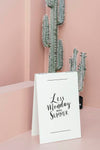 White Poster On A Pastel Pink Floor By Cacti Psd