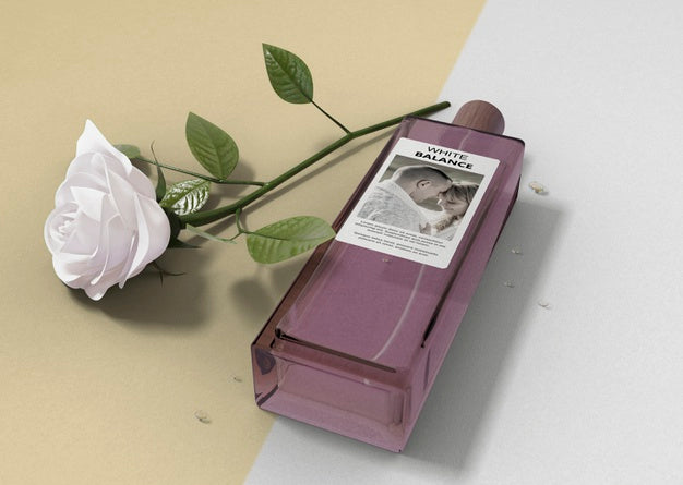 White Rose Beside Perfume Bottle Psd