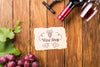 Wine Bottle And Grapes On Table Psd