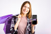 Woman Carrying Paper Bags And Holding A Phone Mock Up Psd