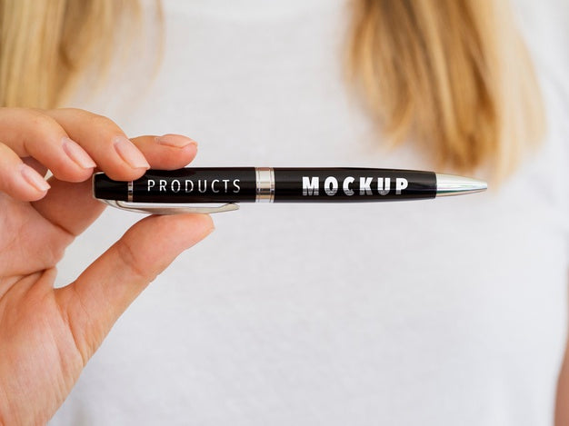 Woman Holding A Black Pen Mock-Up Psd