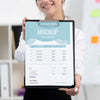 Woman Holding A Blue Mock-Up Clipboard Psd