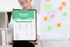 Woman Holding A Green Mock-Up Clipboard Psd