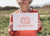 Woman Holding A Meditation Center Logo Sign Psd