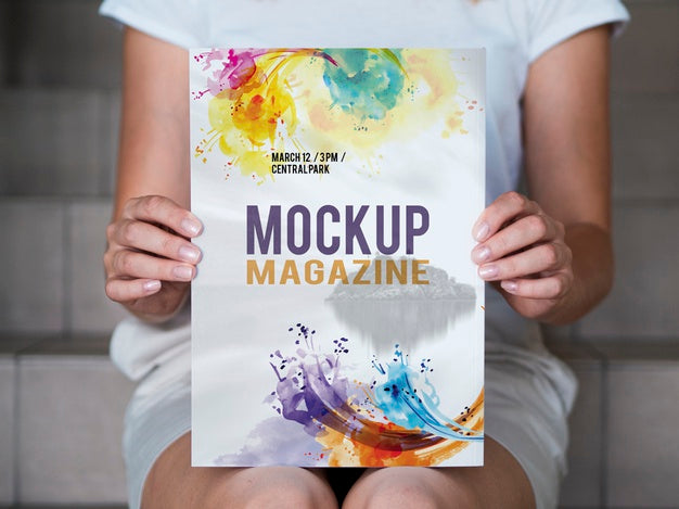 Woman Holding A Mock Up Magazine On Stairs Psd