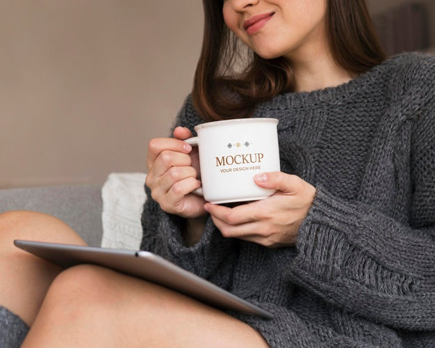 Woman Holding A Mug Mock-Up In Winter Psd