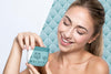 Woman Holding A Skincare Product Mock-Up Psd