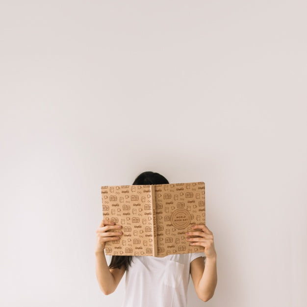 Woman Holding Book Cover Mockup Psd