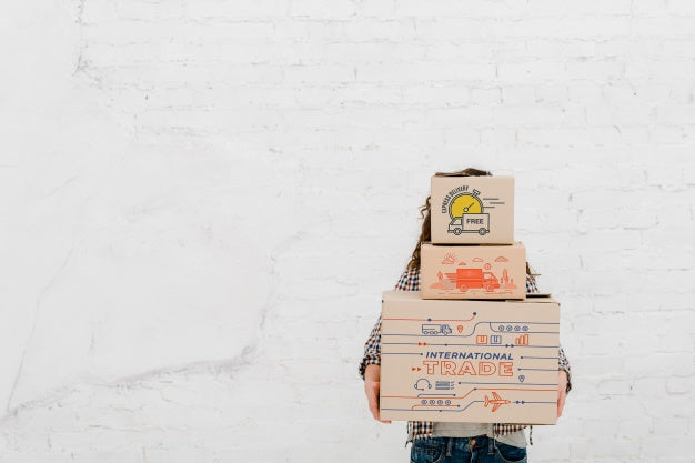 Woman Holding Boxes With Copyspace Psd