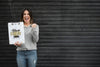 Woman Holding Clipboard Mockup With Black Friday Concept Psd