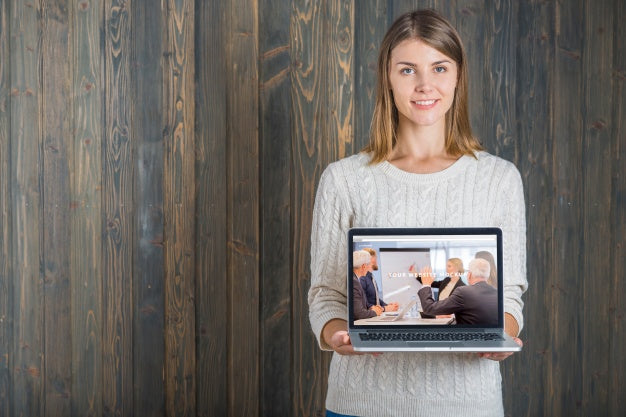 Woman Holding Laptop Mockup Psd