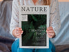 Woman Holding Magazine About Nature Psd