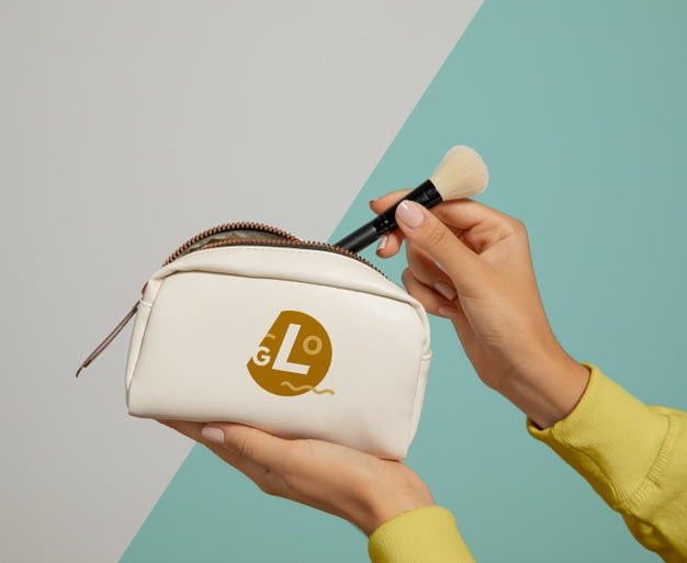 Woman Holding Make-Up Pouch Psd