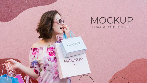Woman Holding Mock-Up Paper Bags Psd