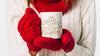 Woman Holding Mug Mockup With Christmas Concept Psd