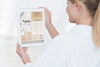 Woman Holding Tablet Mock-Up With Spa Offers Psd