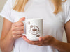 Woman Holding Up A Coffee Mug Psd